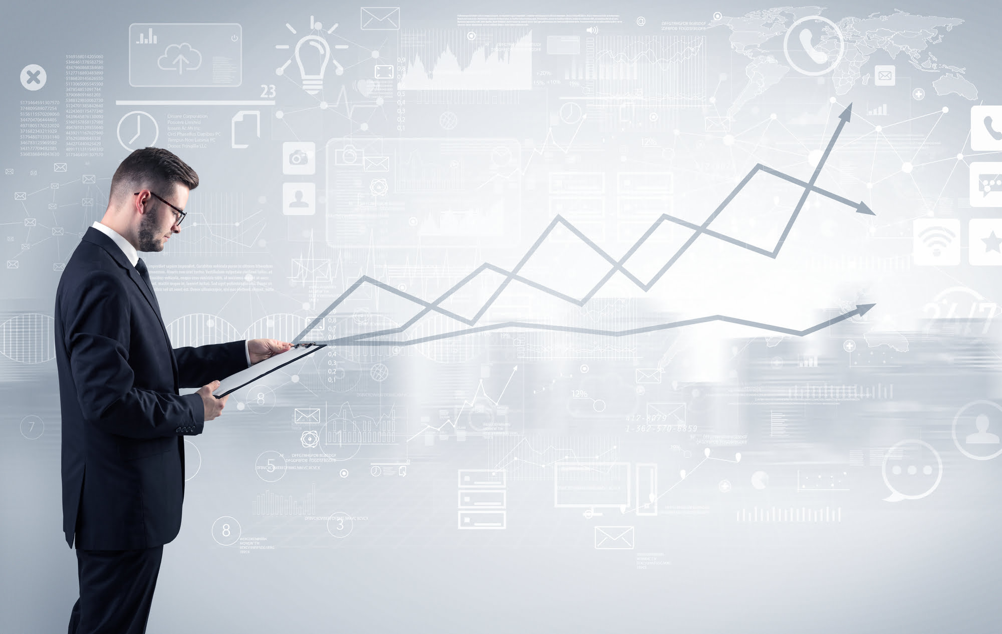Young adviser with operational concept around Adviser standing and presenting economical results of a global company